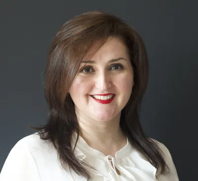 Headshot of Syel Immigration Partner Andrea Lukac