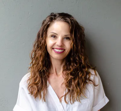 Headshot of Syel Immigration Founder and Managing Director Korinn